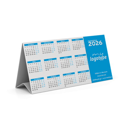 	Ημερολόγιο Τριγωνικό	Ανακαλύψτε το μοναδικό τριγωνικό ημερολόγιο που στέκεται σταθερά πάνω σε γραφείο ή τραπέζι, προσφέροντας έναν πρωτότυπο τρόπο οργάνωσης του χρόνου σας. Το ημερολόγιο διαθέτει εκτύπωση και στις δύο πλευρές, με τα μηνιαία ημερολόγια τοποθετημένα στη μία όψη, ενώ η άλλη μπορεί να περιλαμβάνει γραφικά ή το λογότυπο της επιχείρησής σας.	Το υλικό του αποτελείται από ανθεκτικό χαρτί 150γρ, διασφαλίζοντας την σταθερότητα και την μακροχρόνια χρήση του. Αξιοποιεί τη δυνατότητα προσαρμογής της εκτύπωσης σε κάθε πλευρά, για μέγιστη προβολή.	Μπορείτε να ξεχωρίσετε την επιχείρησή σας με την προσαρμογή του λογοτύπου και των στοιχείων επικοινωνίας σας, εξασφαλίζοντας καθημερινή ορατότητα. Οι λεπτομέρειες από τις φωτογραφίες δείχνουν τη διπλή εκτύπωση, τα παλ Λευκά χρώματα και τη συνολική υψηλή ποιότητα εκτύπωσης.	Το ημερολόγιο αυτό είναι ιδανικό για χρήση σε γραφεία, καταστήματα ή ως διαφημιστικό δώρο, προσφέροντας συνεχή προβολή του λογοτύπου της επιχείρησής σας. Επικοινωνήστε μαζί μας για να δημιουργήσουμε ένα τριγωνικό ημερολόγιο που να καλύπτει τις ανάγκες σας. 