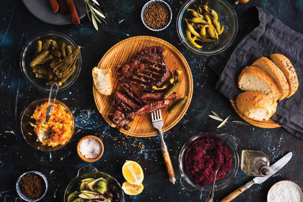 Προτάσεις για διακόσμησηΟ πίνακας σε καμβά FADC-066, με θέμα τα φαγητά και ποτά, ενσωματώνει μια διαχρονική αισθητική που μπορεί να αναδείξει διάφορα στυλ διακόσμησης. Σε έναν μοντέρνο χώρο, μπορεί να προσφέρει ένα εκλεπτυσμένο σημείο εστίασης, συνδυάζοντας τα πολυχρωματικά μοτίβα του με τα λιτά έπιπλα και τις καθαρές γραμμές. Σε έναν κλασικό εσωτερικό χώρο, παραπέμπει σε παλαιότερες εποχές φιλοξενίας και κατανάλωσης, προσθέτοντας μια νότα νοσταλγίας. Τέλος, σε ένα μινιμαλιστικό περιβάλλον, ο πίνακας αυτός μπορεί να λειτουργήσει ως πίνακας εστίασης, προσδίδοντας ζωντάνια και ενέργεια μέσω των ζωντανών αποχρώσεων του.Λίγα λόγια για τον πίνακαΗ χρήση του παραδοσιακού θέματος σε συνδυασμό με τη σύγχρονη τεχνική δημιουργεί ένα ενδιαφέρον αντιπαράθεμα στον πίνακα FADC-066. Οι πινελιές είναι απαλές, καθορίζοντας τις μορφές των αντικειμένων με μεγάλη λεπτομέρεια, δίνοντας την αίσθηση της γευστικής πολυπλοκότητας. Οι ζεστές αποχρώσεις του καφέ και του χρυσού επικοινωνούν την αίσθηση της θαλπωρής και της φιλοξενίας. Ο συμβολισμός εδώ βρίσκεται στην υλική αφθονία και απόλαυση, υπογράμμισε την ουσία της στιγμιαίας απόλαυσης και του γαστρονομικού πειρασμού.Ο πίνακας δημιουργεί αίσθηση ευχαρίστησης και ζωντάνιας στο θεατή. Οι αποχρώσεις και οι λεπτομέρειες στο έργο προσκαλούν τον παρατηρητή σε μια οπτική γιορτή, προκαλώντας έντονες σκέψεις και συναισθήματα αφθονίας. Η λεπτομερής απόδοση των υλικών στοιχείων, όπως ένα πλούσιο τραπέζι φαγητού, μπορεί να φέρει συναισθήματα άνεσης και προσμονής για τις μικρές χαρές της ζωής.Ψηφιακή εκτύπωση σε καμβά. Ο καμβάς είναι υψηλής ποιότητας, ειδικός για ψηφιακή εκτύπωση που αναδεικνύει τα χρώματα. Είναι ιδανικός για διακόσμηση εσωτερικών χώρων. Παραλαμβάνετε τον πίνακα με την ψηφιακή εκτύπωση καμβά, τελαρωμένο σε τελάρο από ανθεκτικό ξύλο 2εκ, στη διάσταση που θέλετε.