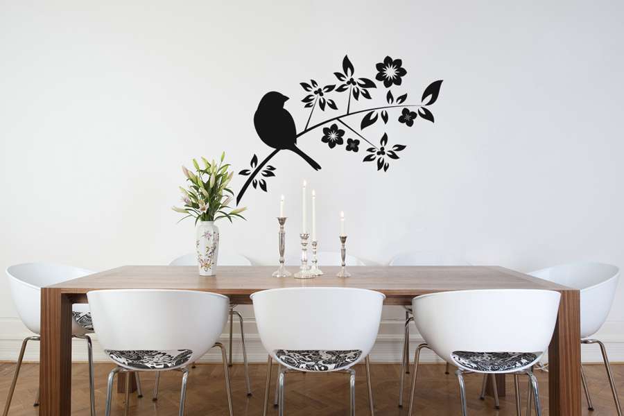 Αυτοκόλλητο τοίχου από βινύλιο που απεικονίζει ένα κλαδί με φύλλα και άνθη και με ένα πουλί. Είναι ανθεκτικό και κολλάει και ξεκολλάει εύκολα.Μπορείτε να μας ζητήσετε να εκτυπωθεί σε ότι διάσταση και χρώμα θέλετε.  