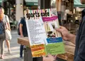 Flyer με φωτεινό κόκκινο και κίτρινο φόντο, οργανωμένο layout και ευανάγνωστη γραμματοσειρά για προσφορές.