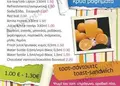 Flyer με φωτεινό κόκκινο και κίτρινο φόντο, οργανωμένο layout και ευανάγνωστη γραμματοσειρά για προσφορές.